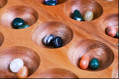 Rombol Wooden Hus Bao Game