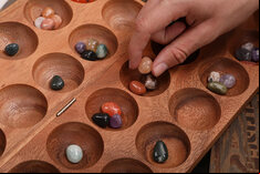 Rombol Wooden Hus Bao Game