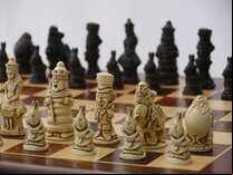 Alice in Wonderland Ornamental Chess Set (cream & brown, board not included)
