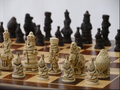 Alice in Wonderland Ornamental Chess Set (cream & brown, board not included)