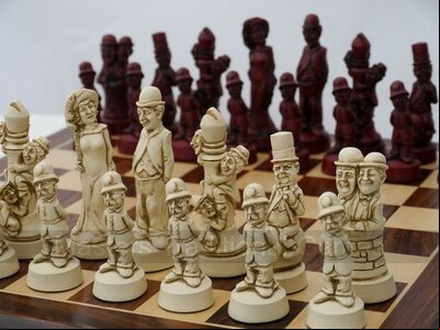 Classic Movie / Film Stars Ornamental Chess Set by Berkeley Chess (in cream & red, chessboard not included)