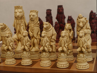 Reynard the Fox Ornamental Chess Set by Berkeley Chess (cream & red, board not included)